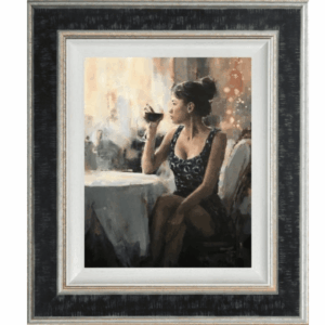 Tony Hinchliffe, a romantic and enigmatic piece of a lady, gazing into the distance holding a glass of red wine