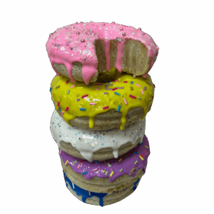 Natasha Boast, a colourful stack of resin donuts with a bite out of the top one