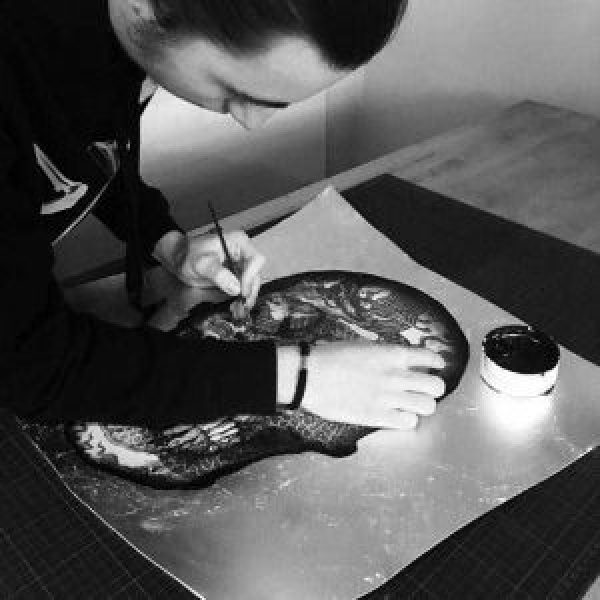 Chuck Chuck, black and white photograph of the artist at work