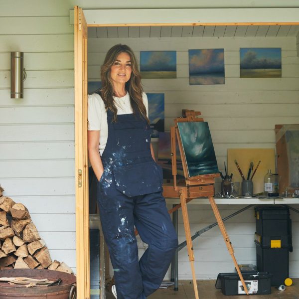 Sharon Goodenough Sharon Goodenough, colour photograph of the artist standing by her studio